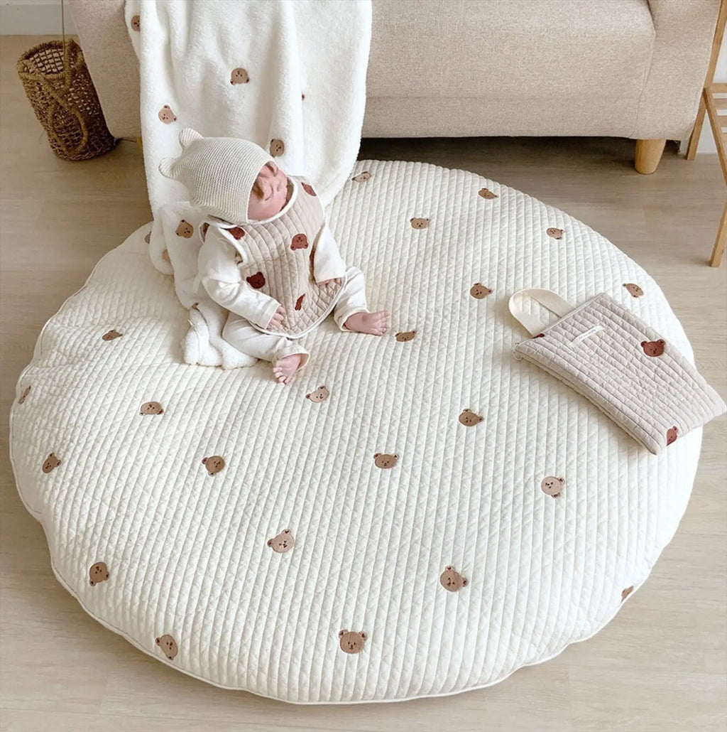 Tapis rond brodé pour bébé